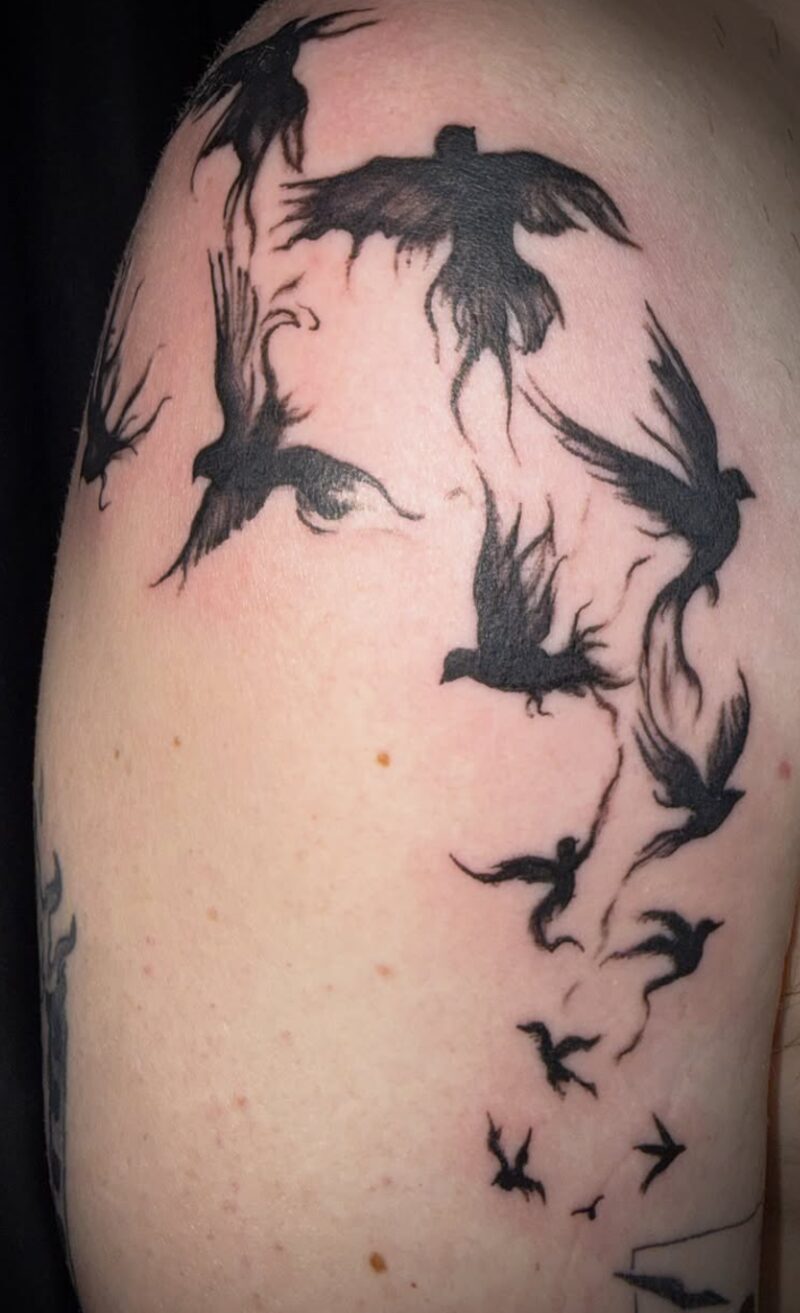Black and grey bird flock sleeve tattoo by Mindcrusher Tattoo, Rogers Park Chicago