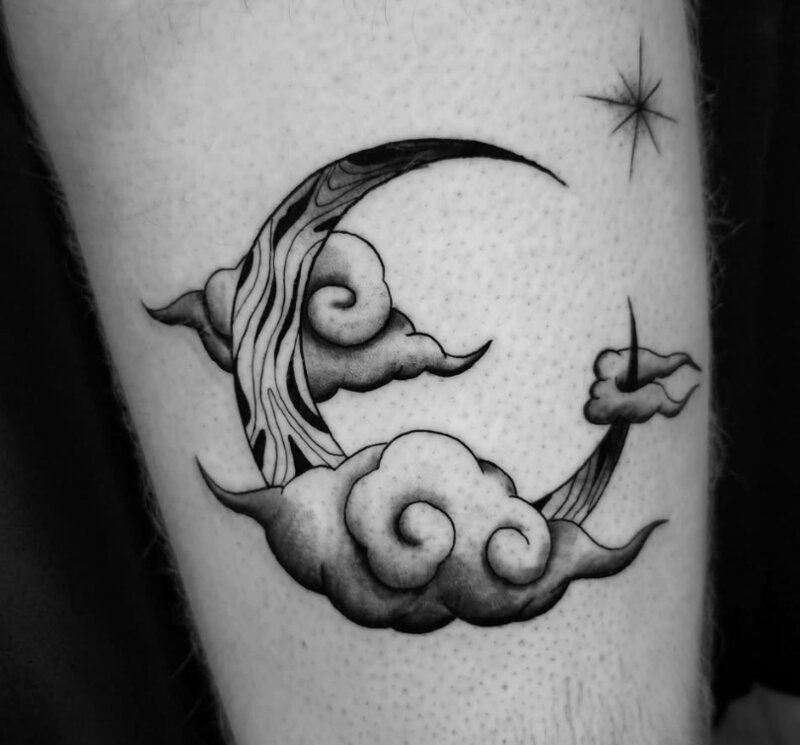 Black and grey crescent moon tattoo by Mindcrusher Tattoo, Rogers Park Chicago