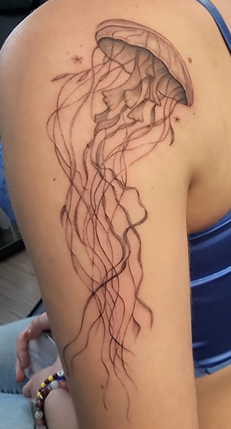 Fine line jellyfish tattoo by Mindcrusher Tattoo, Rogers Park Chicago