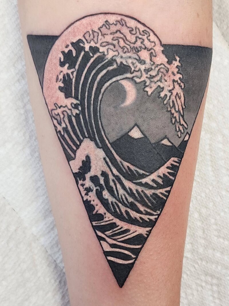 Blackwork geometric wave tattoo by Mindcrusher Tattoo, Rogers Park Chicago