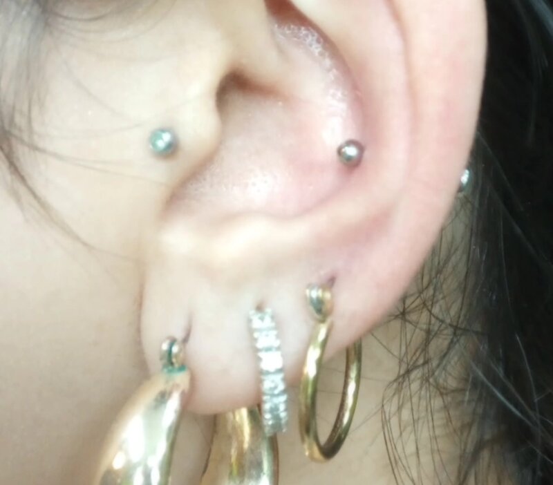 Multiple ear piercings done by Mindcrusher Tattoo, Rogers Park Chicago